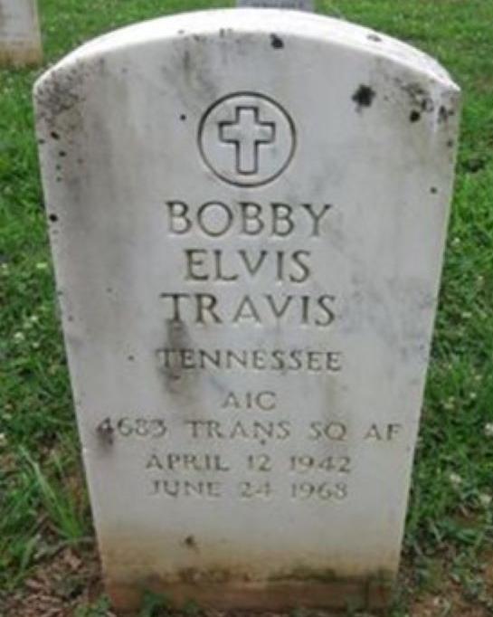 Headstone with detailed inscription belonging to Bobby Travis. 