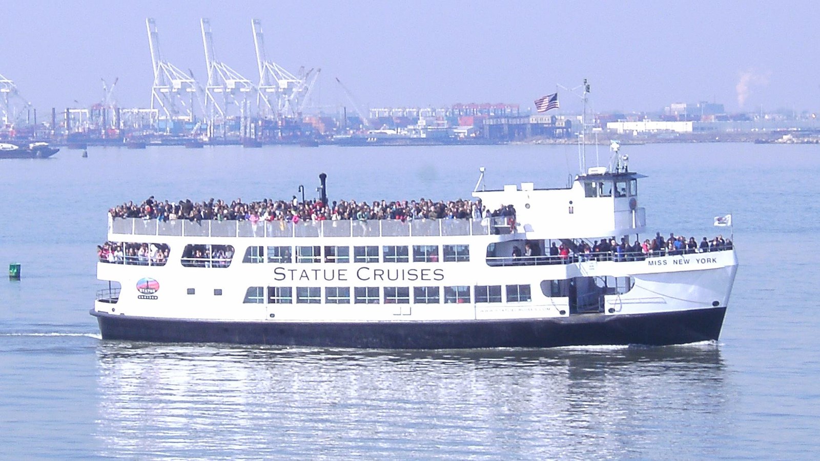 Ferry showing hundreds of visitors in New York Harbor