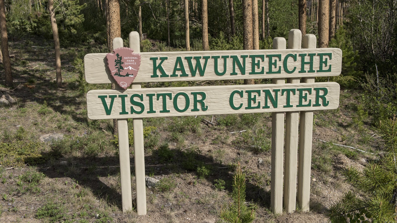5-foot high Wooden Sign posted near the entrane to Kawuneeche Visitor Center