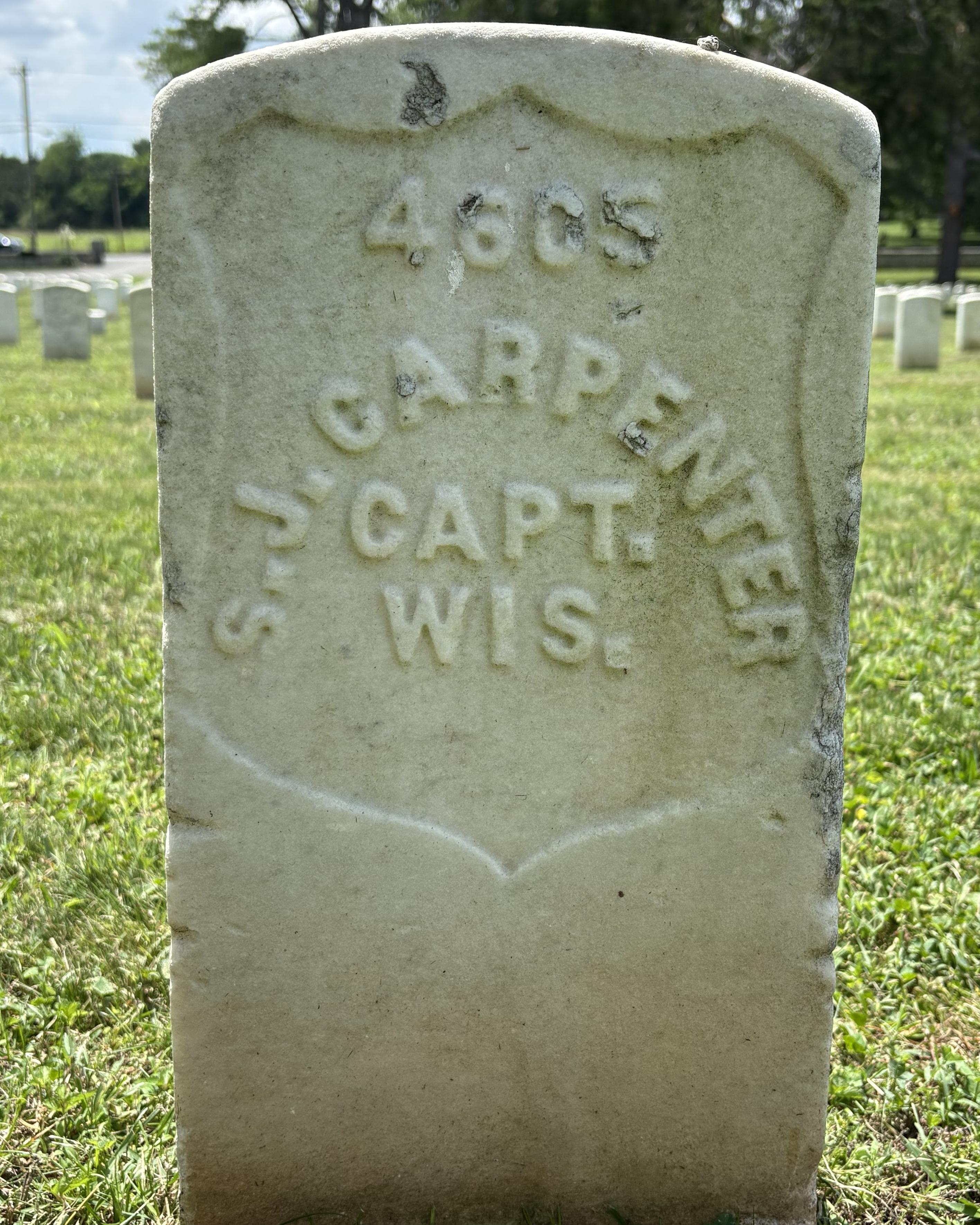 Marble headstone belonging to Stephen Carpenter. 