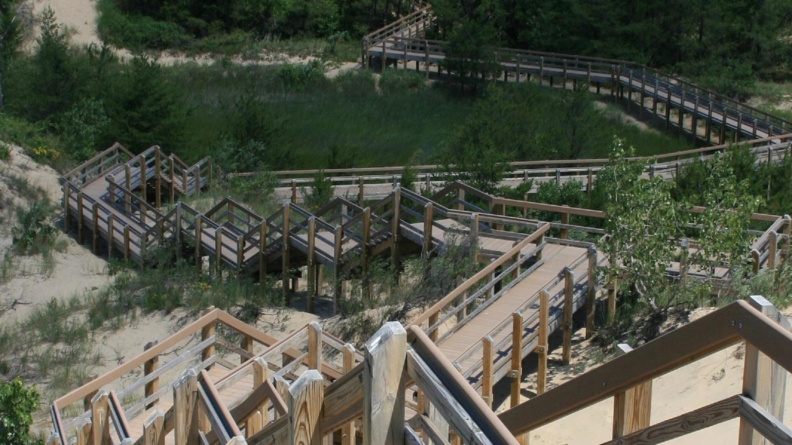 Stairs going down the lakeside of a dune along the Dune Succession Trail.