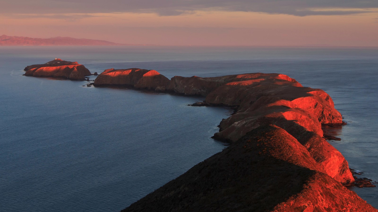 rocky islets with flat tops and steep cliffs. 