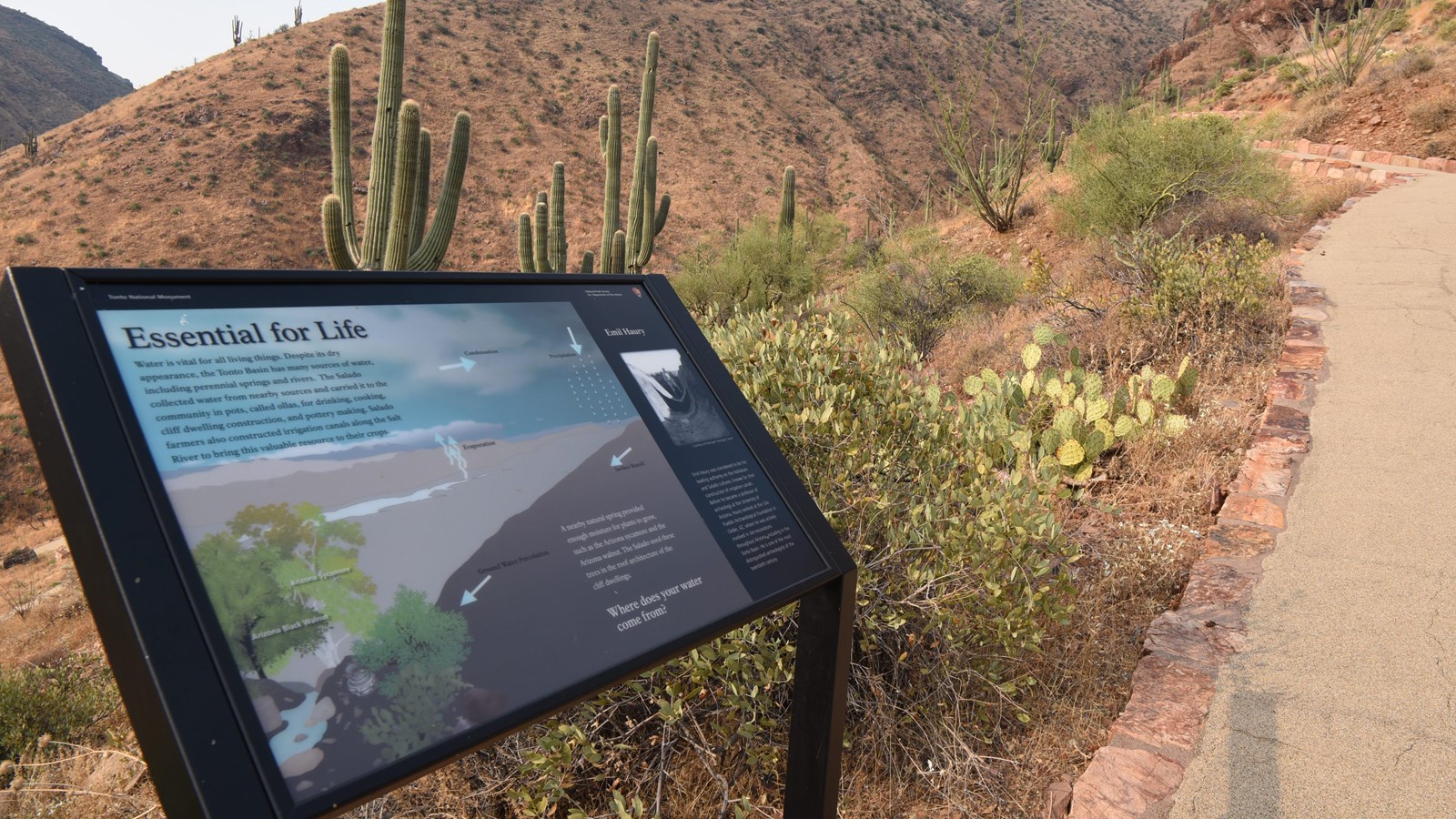 Essential for Life Wayside next to paved path
