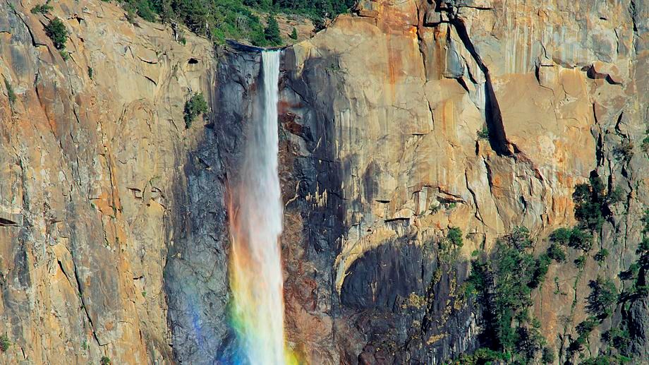 Bridalveil Fall with rainbow in spray of water