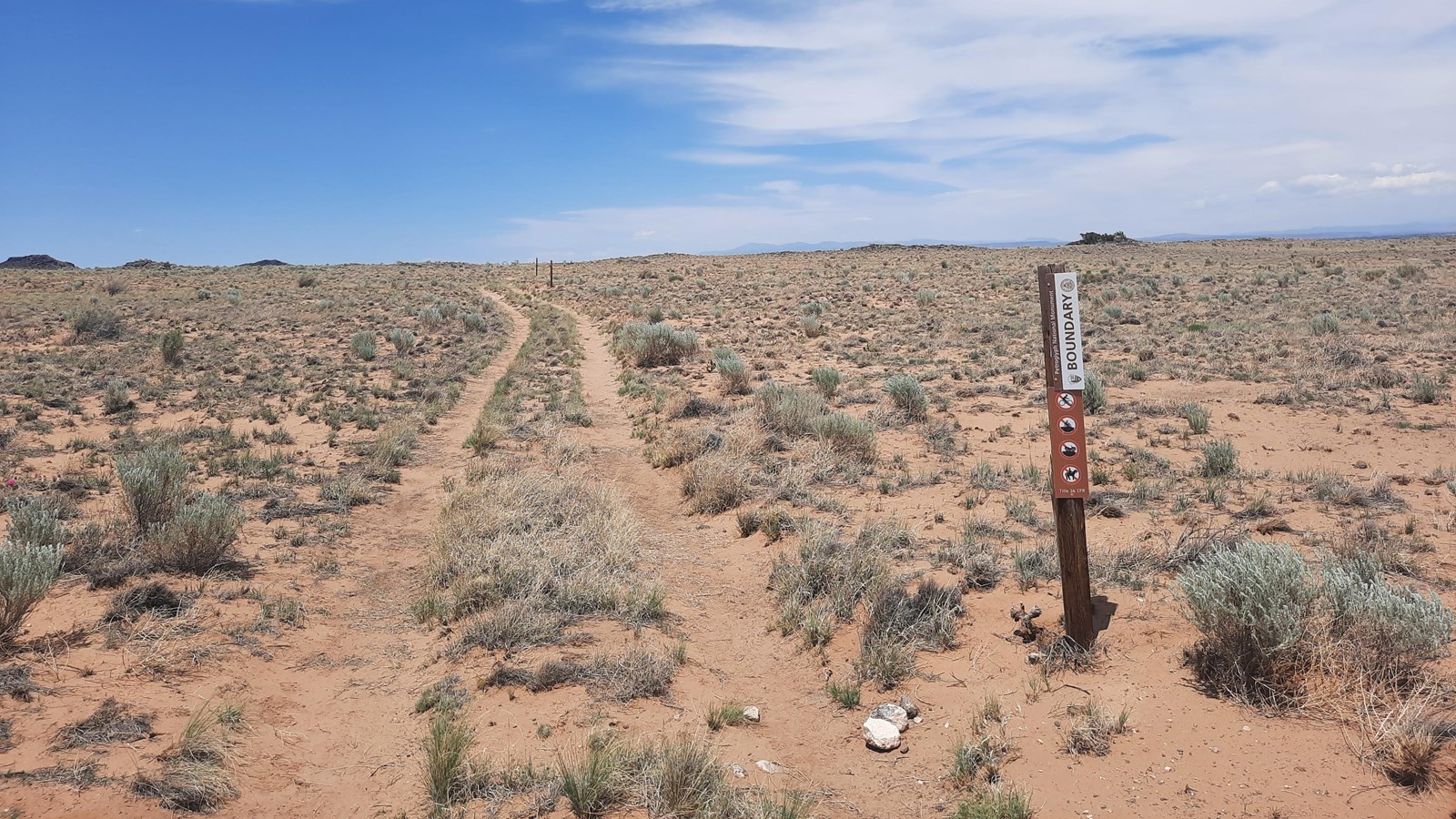 A trail though an arid landscape.