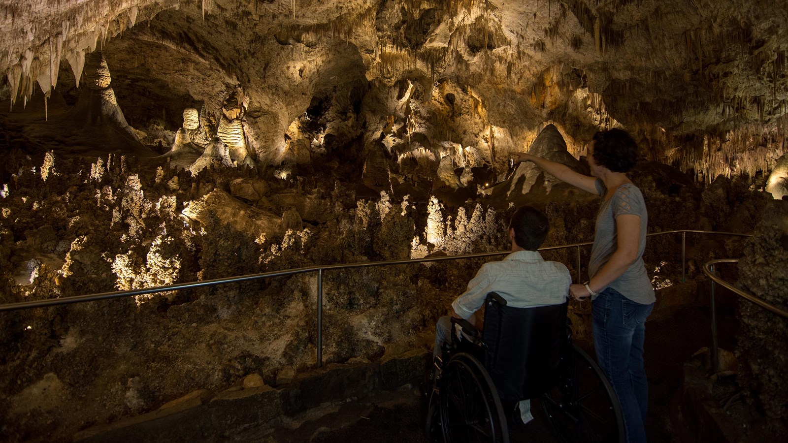 Photo of a visitor in a wheelchair enjoying the Big Room.