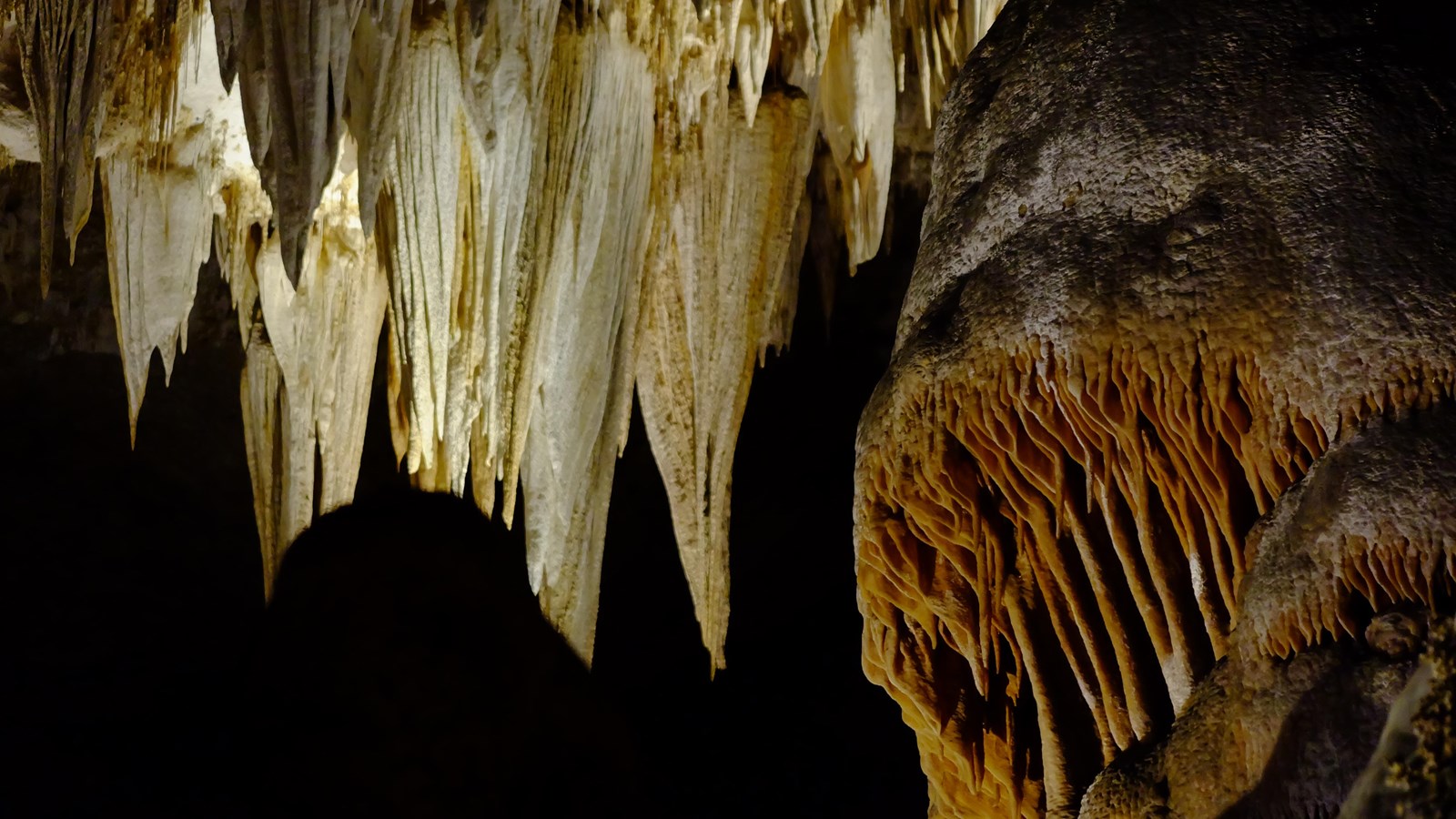 Photo of the Chandelier and Caveman formations in the Big Room.