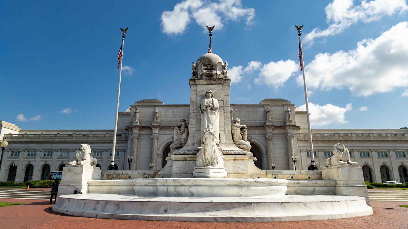 A large fountain with a Christopher Columbus statue. 
