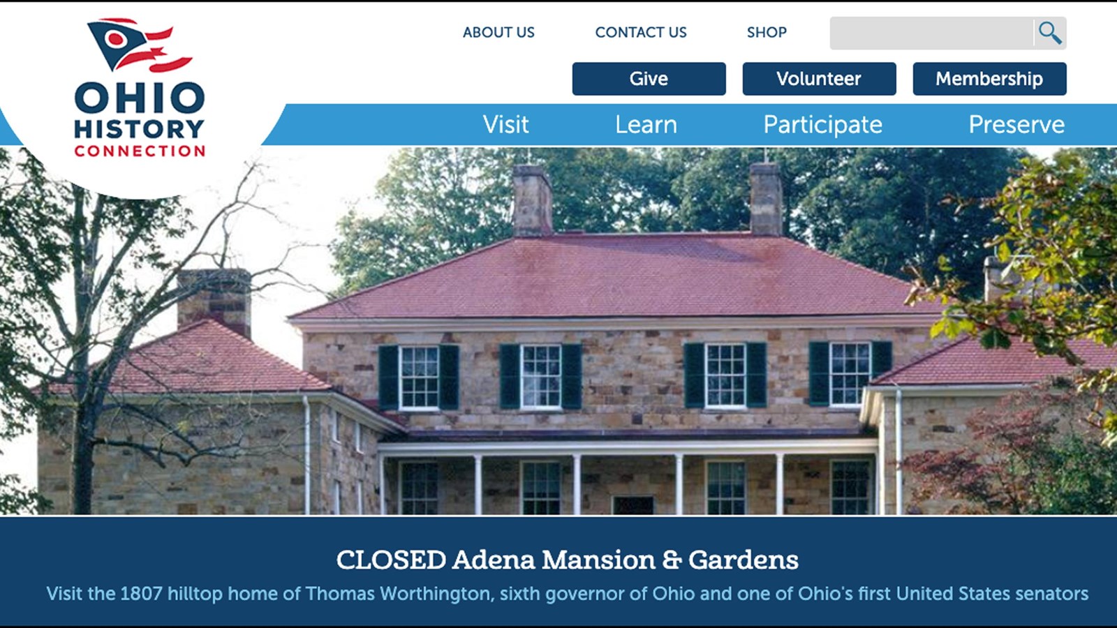 A brick two-story house with a red roof and text in upper left reading Ohio History Connection