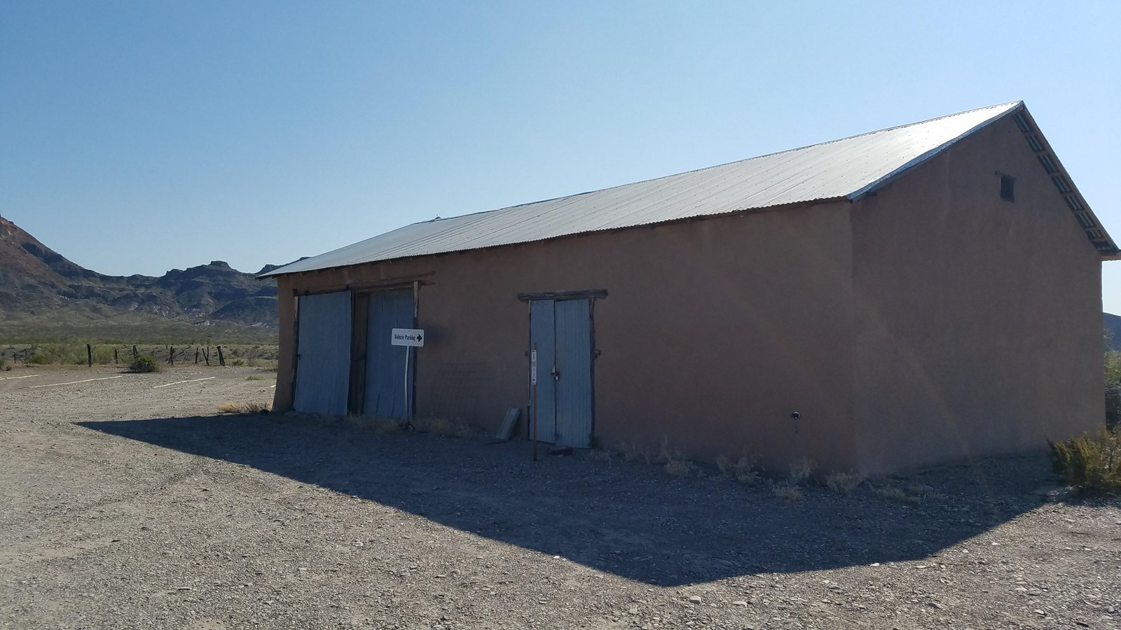 Adobe structure and tin roof of the Recreation Hall in Castolon District