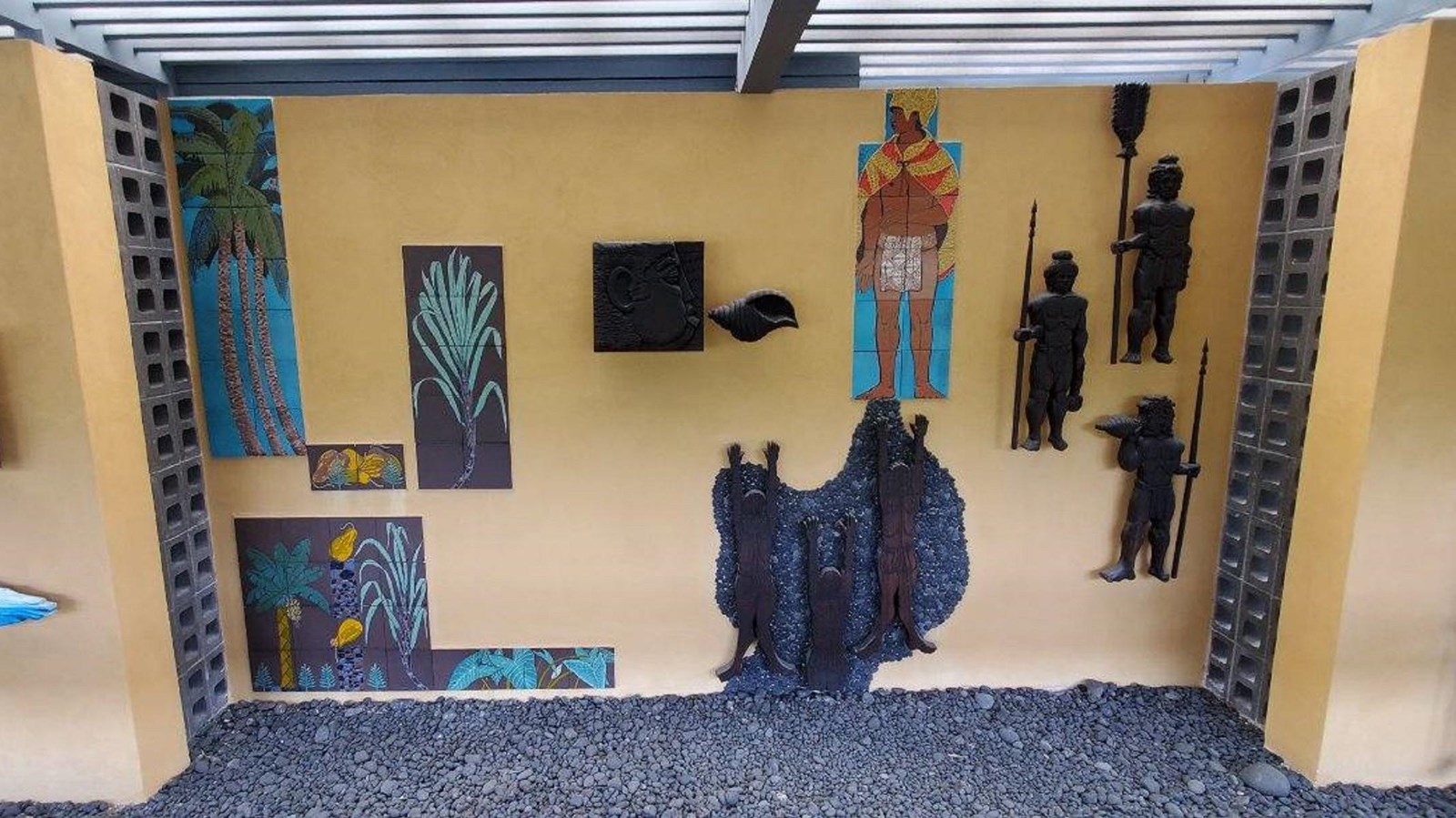 A mixed media mural depicting Hawaiian history.