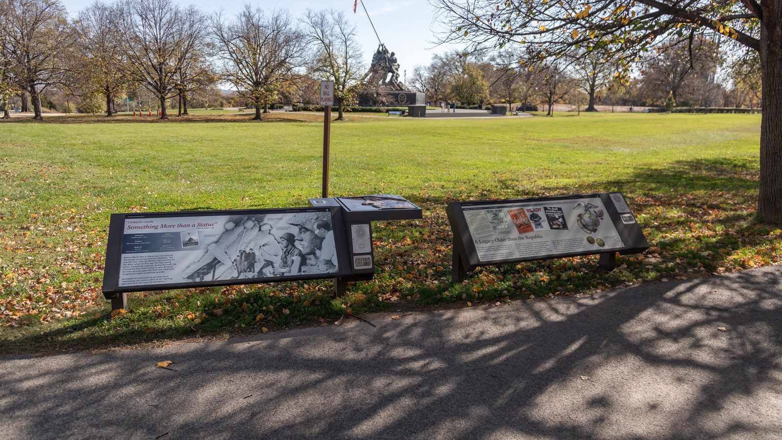 A black and white image of soldiers is positioned next to images of ads for the military years ago.