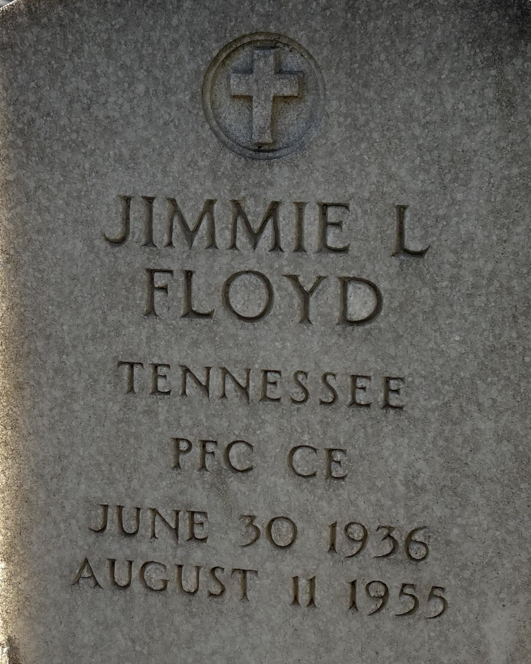 Marble headstone belonging to Jimmy Lee Floyd located in the Stones River National Cemetery.