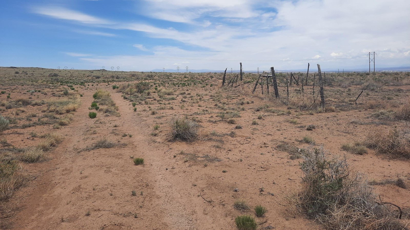 A trail going through an arid landscape. 