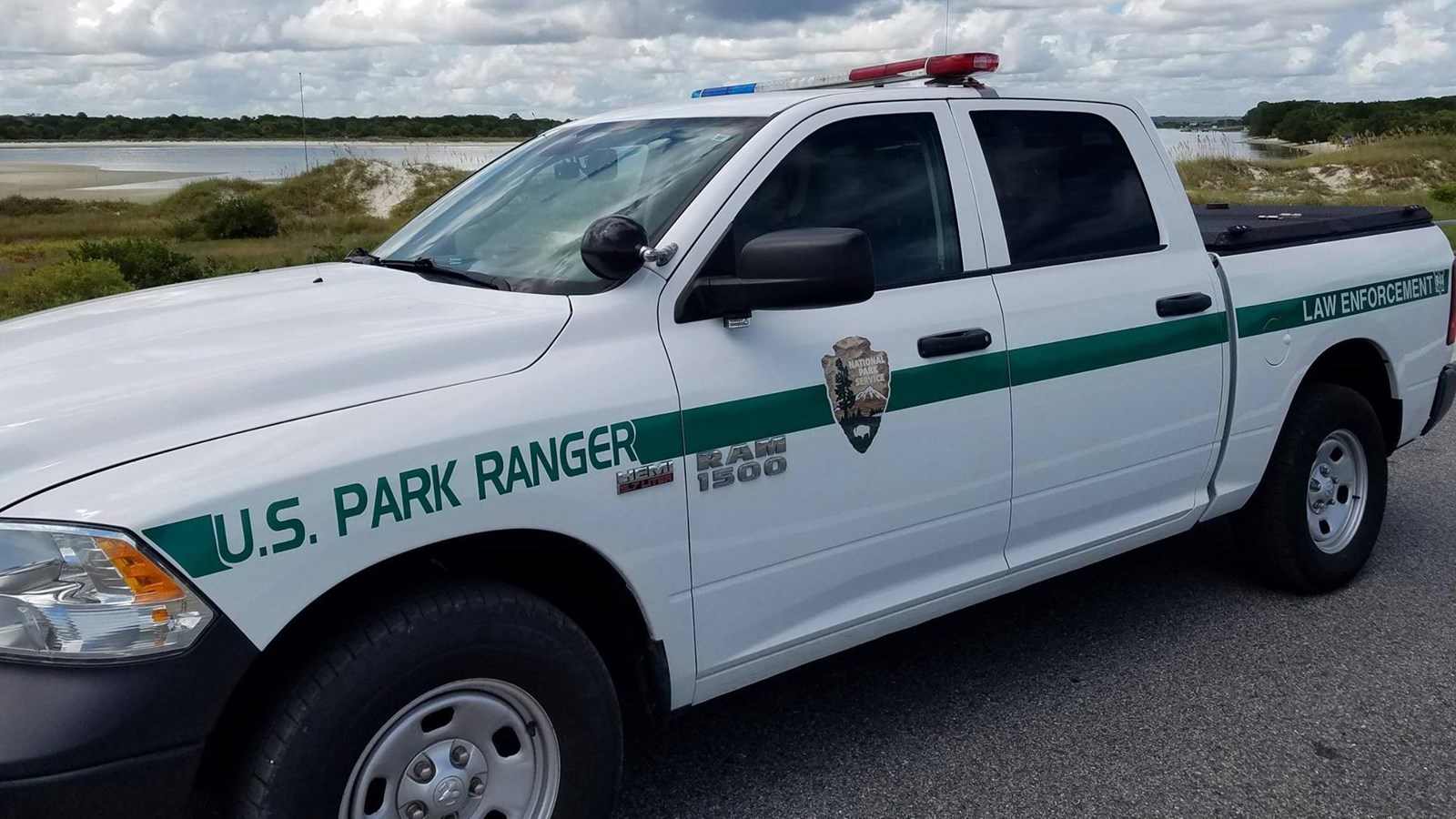 Law Enforcement Truck marked with NPS arrowhead and green stripe