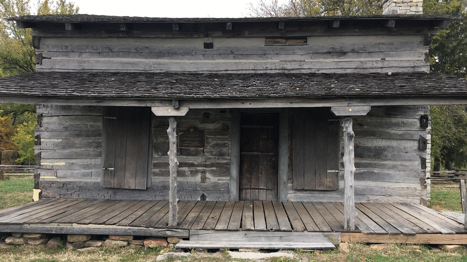 View of the front façade and porch a reproduction of a wooden cabin inhabited by George Rogers Clark