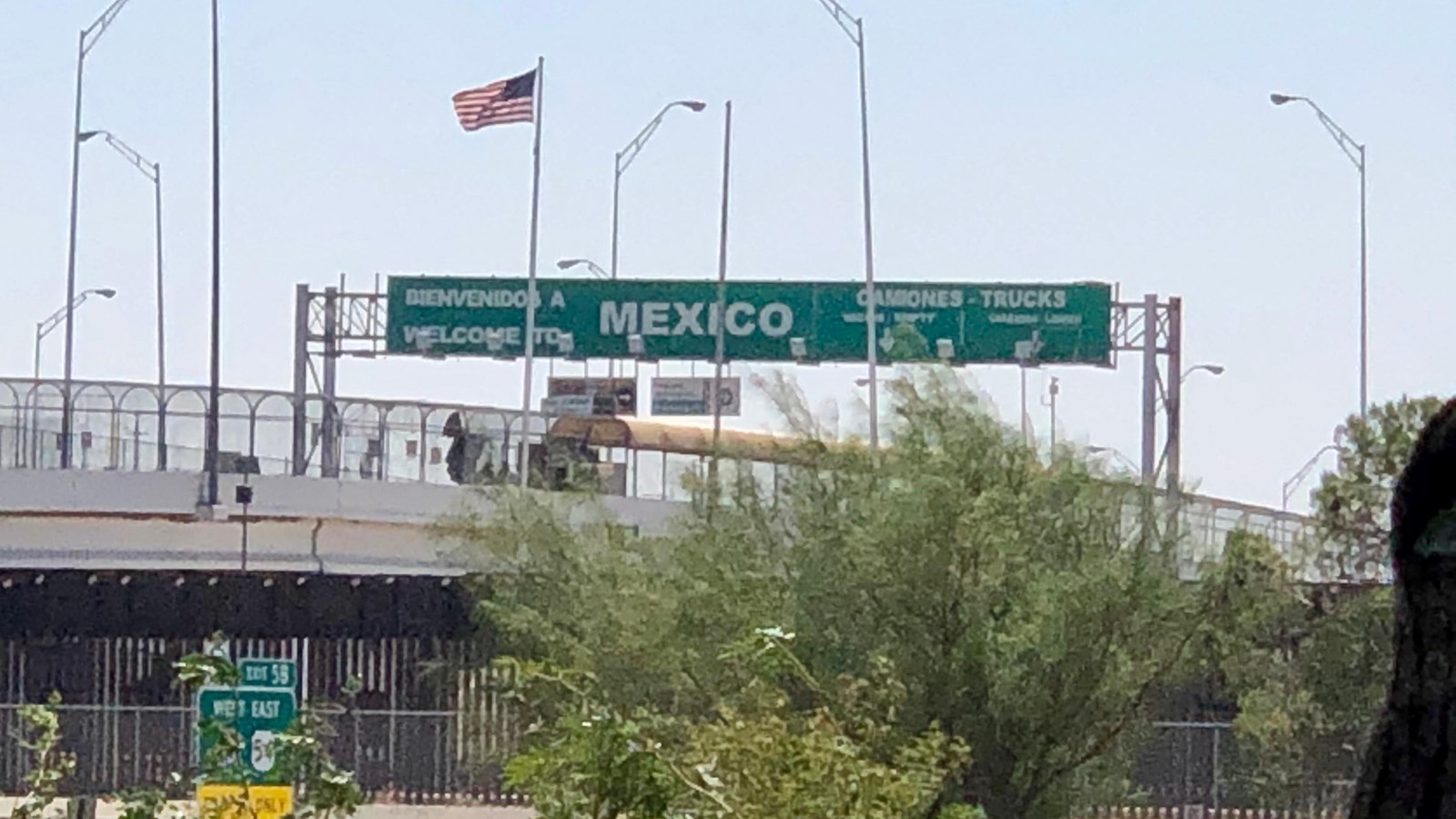 Large, green highway sign with