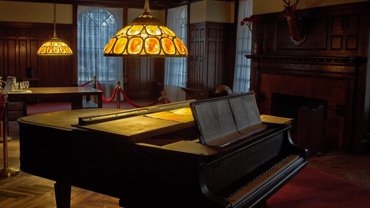 Grand piano with chandelier above