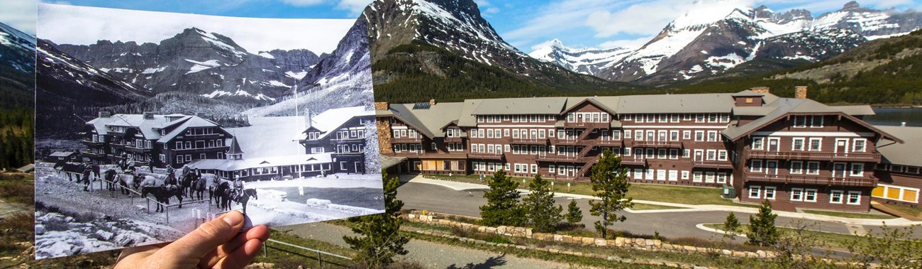 A hand holds historic photo aligned with actual historic hotel building