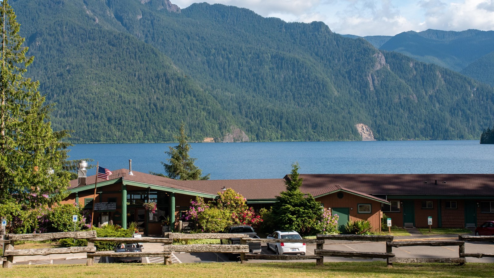 A lakeside lodge viewed from uphill.