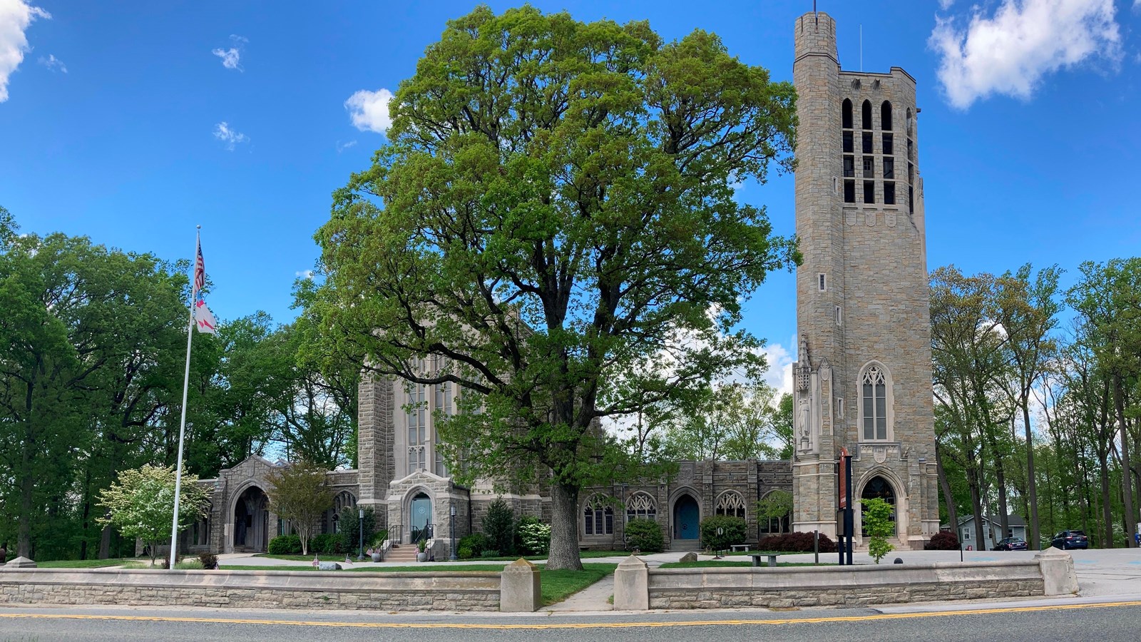 outdoors, stone chapel, bell tower, tree