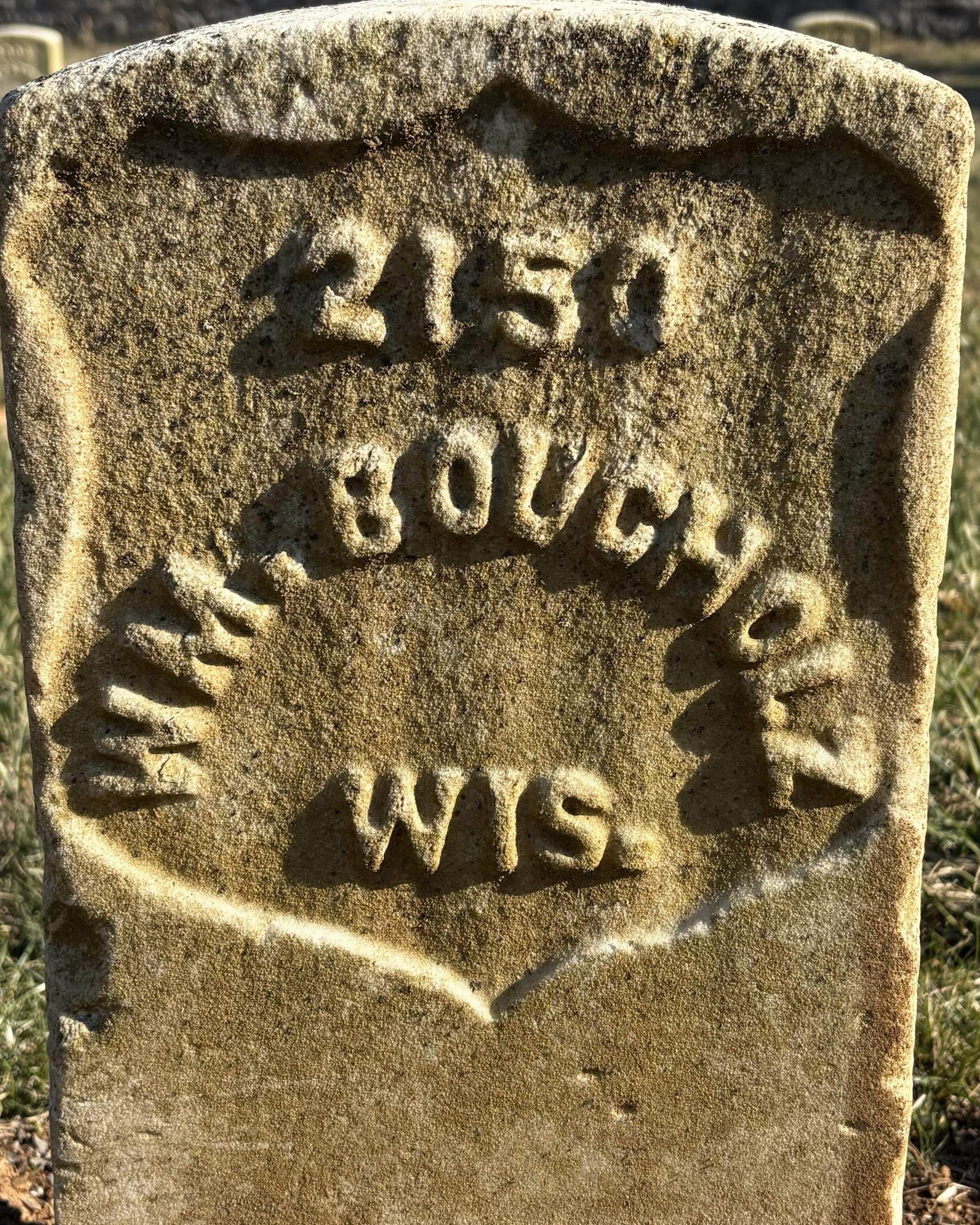 Marble headstone belonging to William Bucholz who served in the American Civil War.
