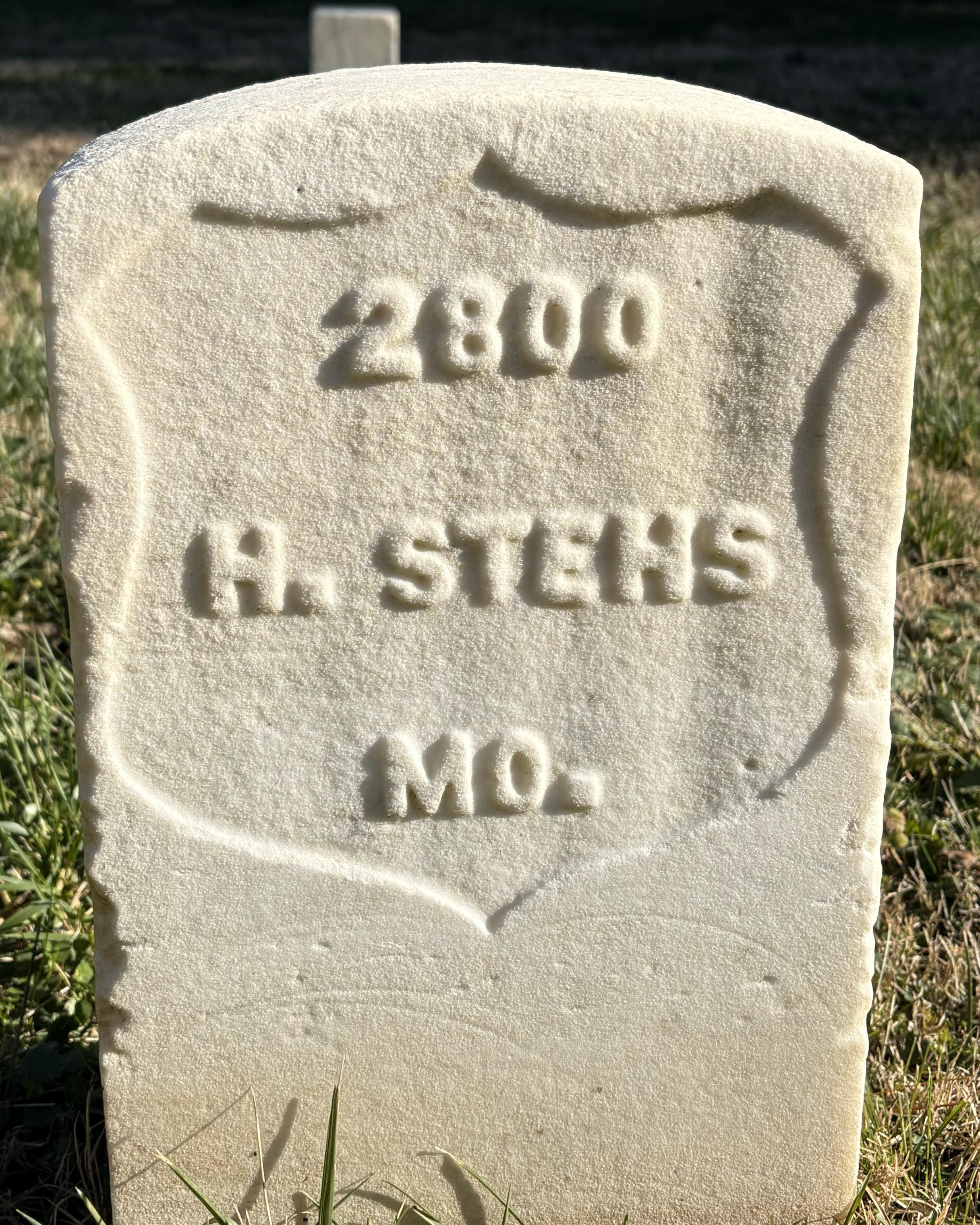 Marble headstone belonging to Henry Stehs, a Union soldier who fought in the Civil War.