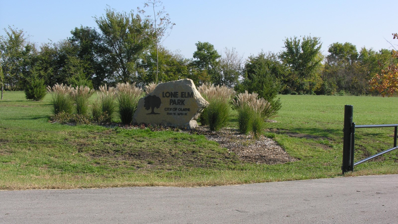 An stone entrance sign reading 