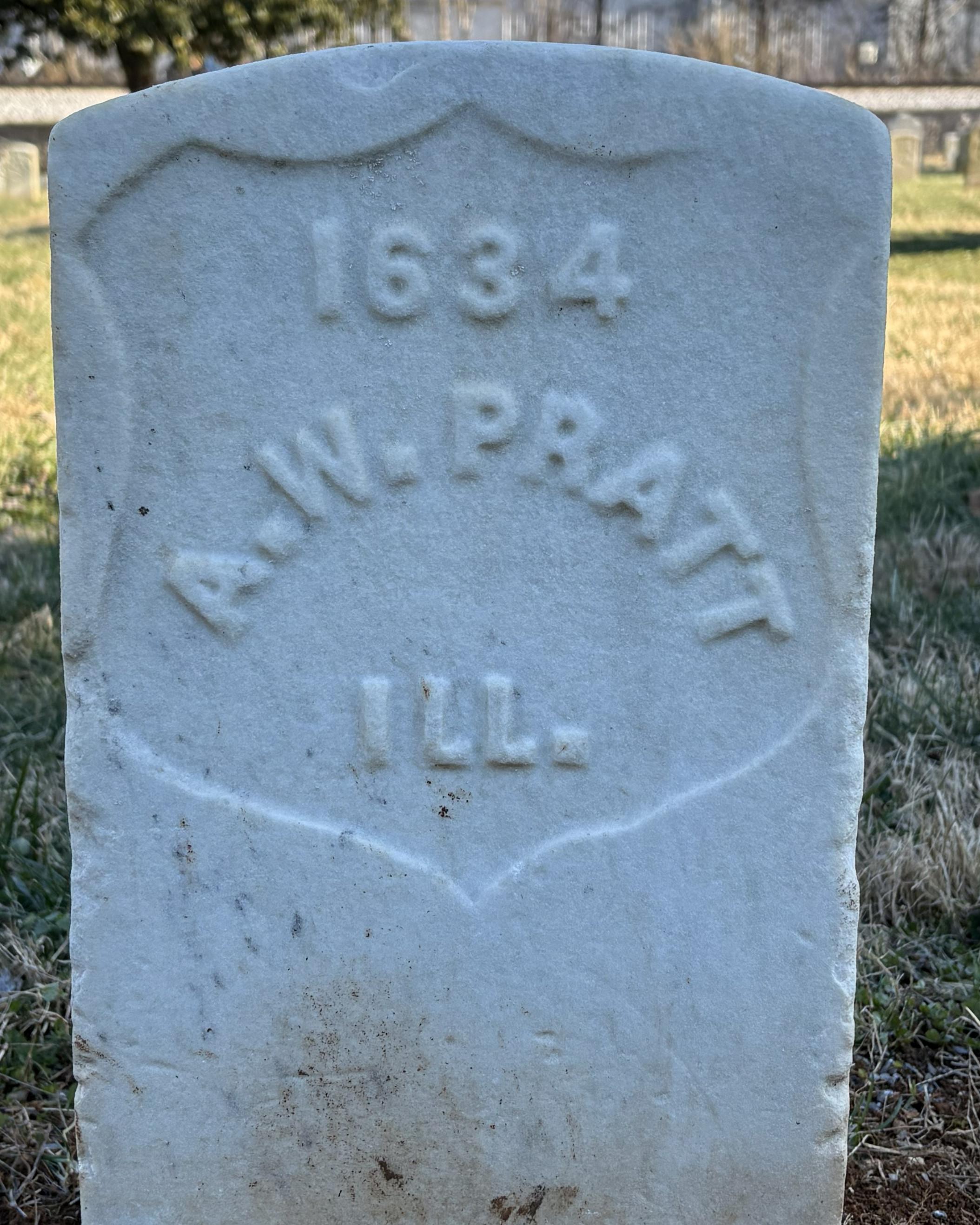 Marble headstone belonging to Archibald M Pratt located in the Stones River National Cemetery.