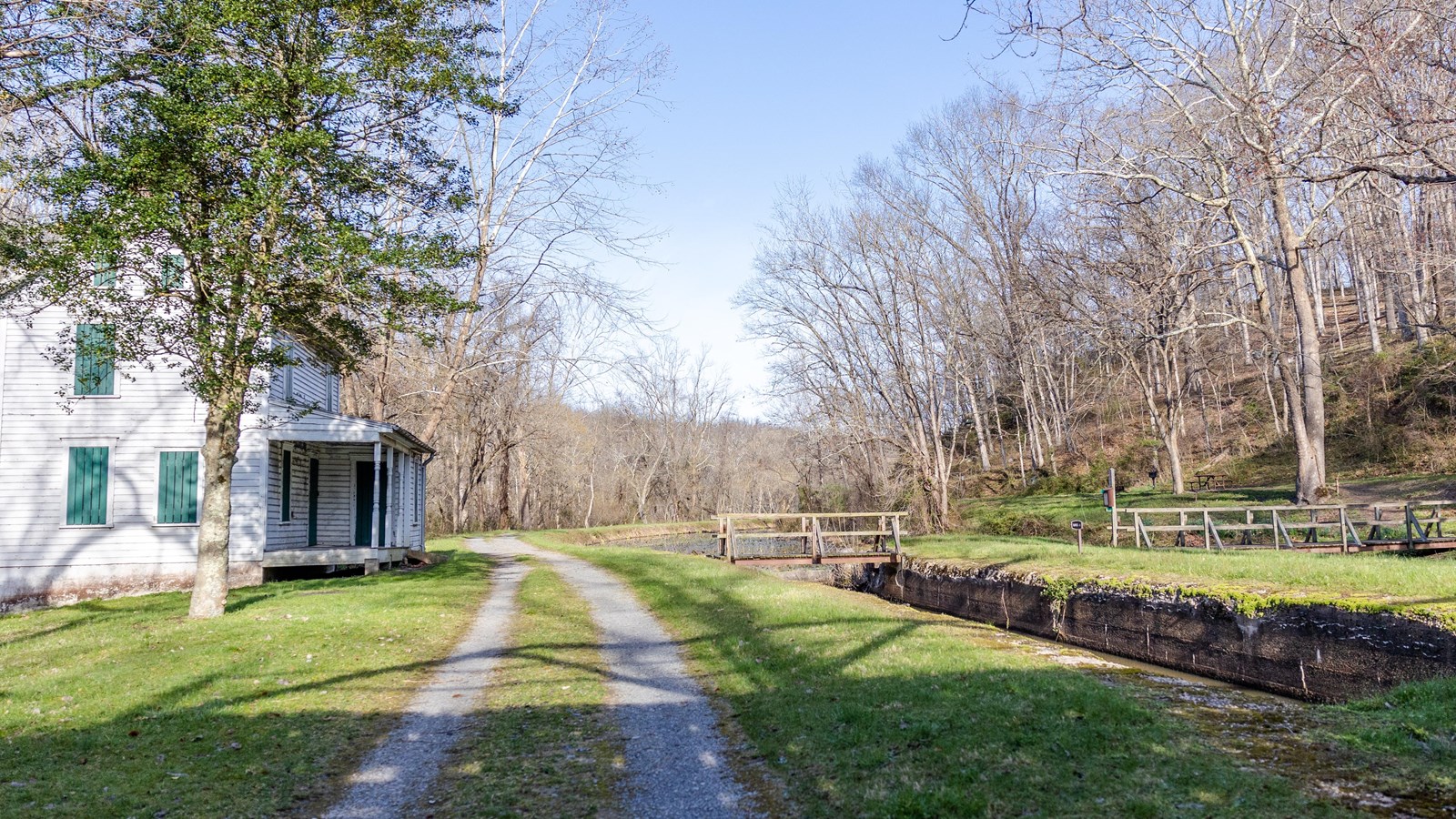 An historic lock next to a lockhouse