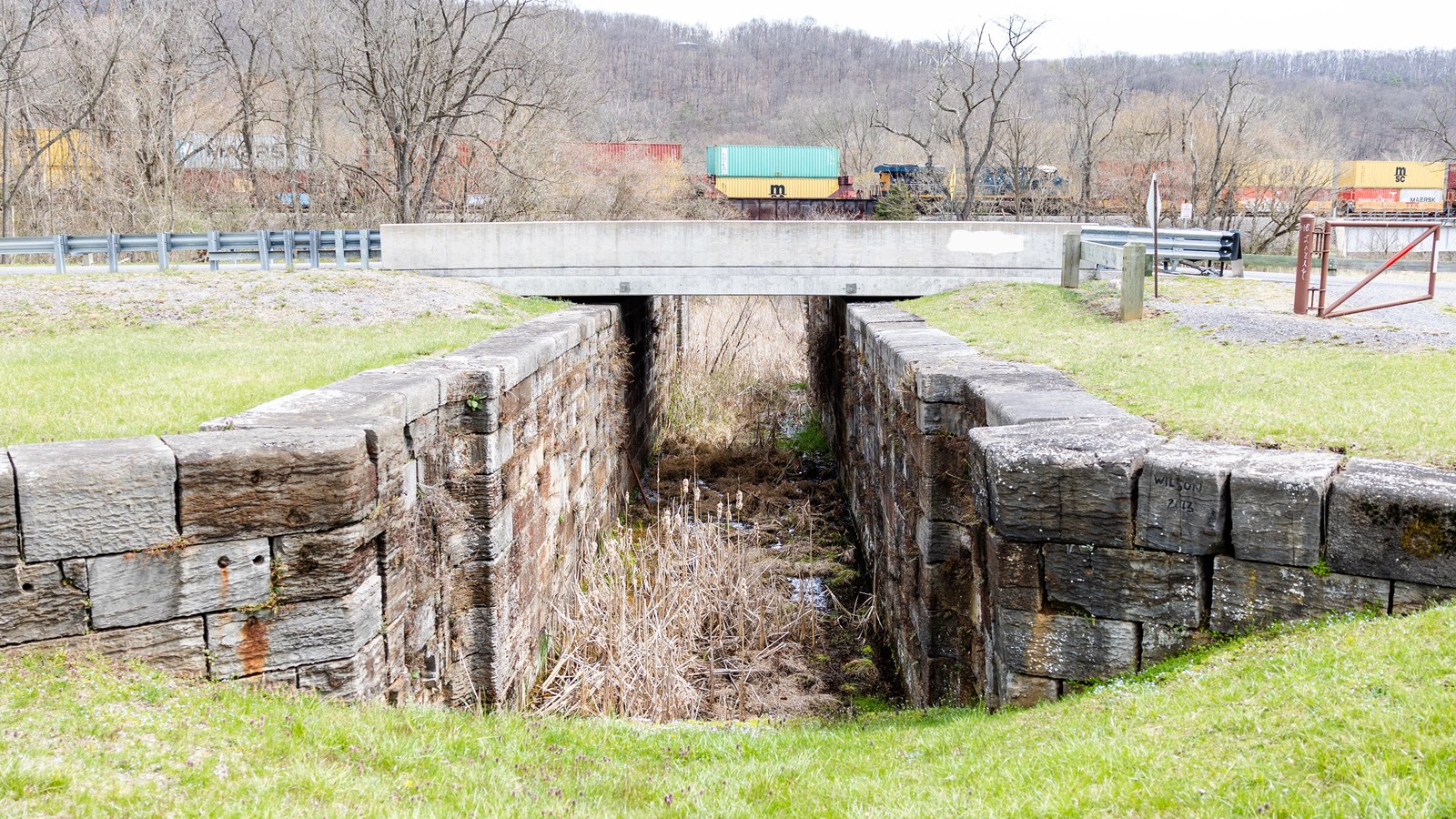 An historic composite lock with a vehicle bridge across it