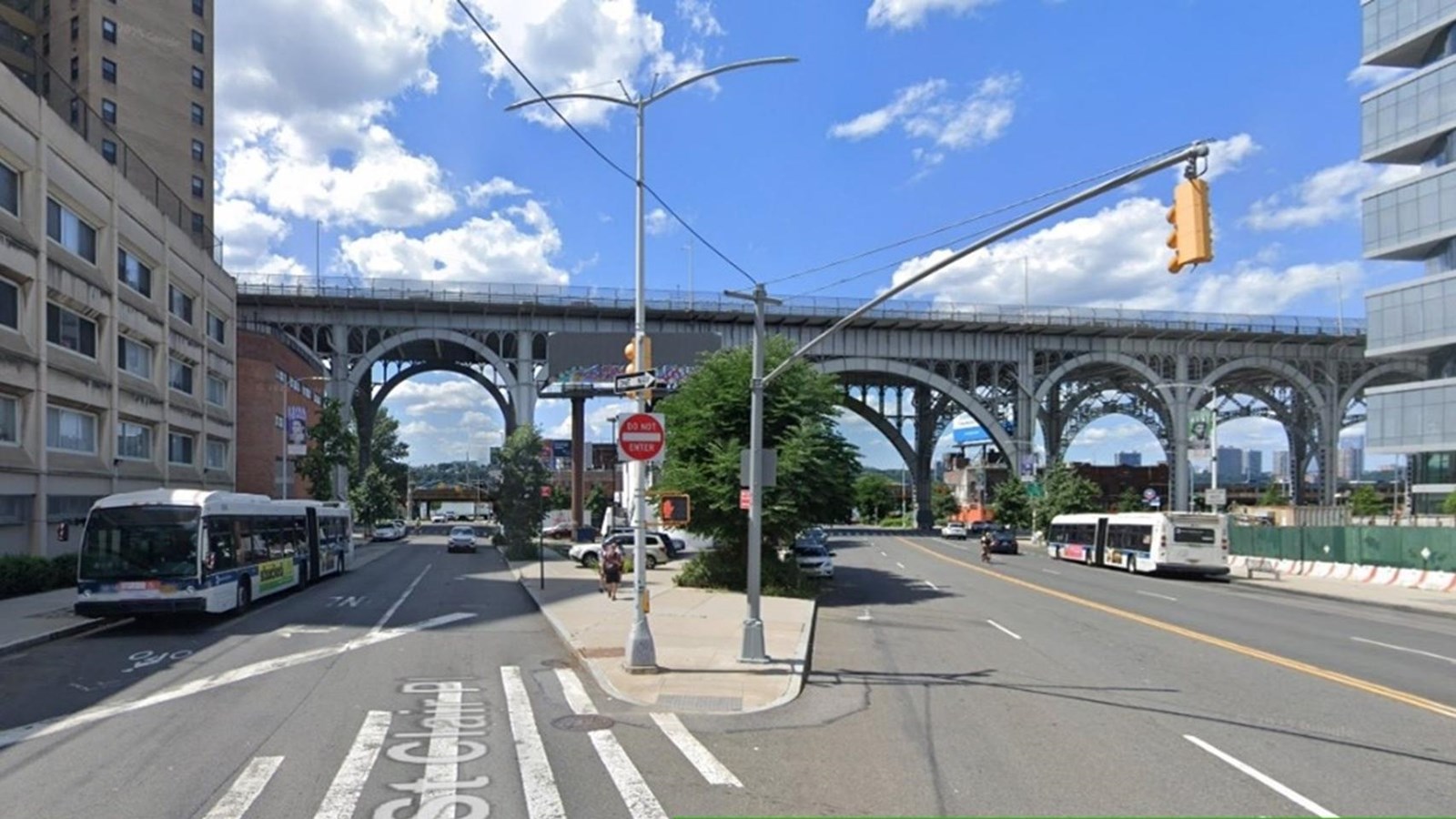 A fork in the road with a bridge in the background