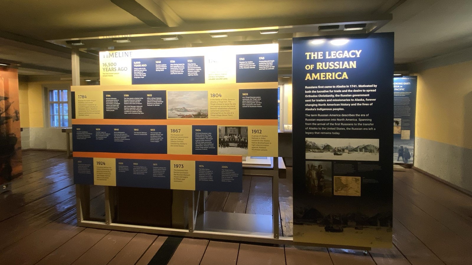 yellow and blue exhibit of a timeline of important events in Russian American History