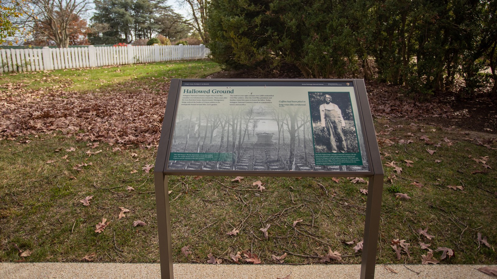 An information panel with illustration of cemetery and inset of a black man.