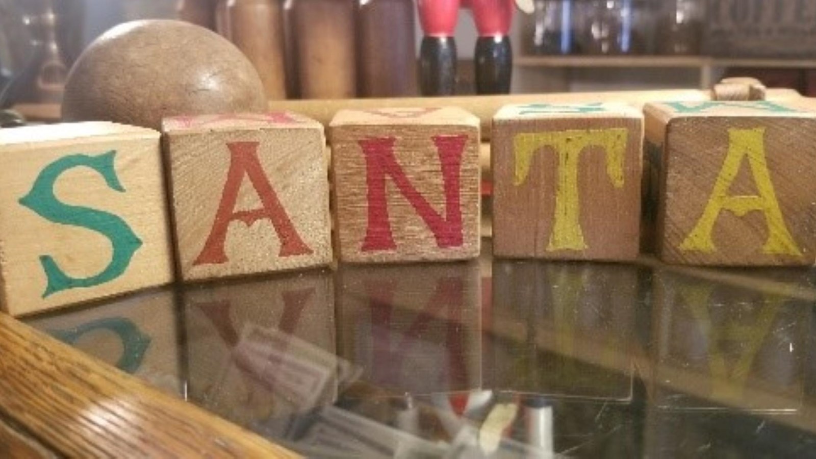 Children’s wooden lettered blocks spell Santa