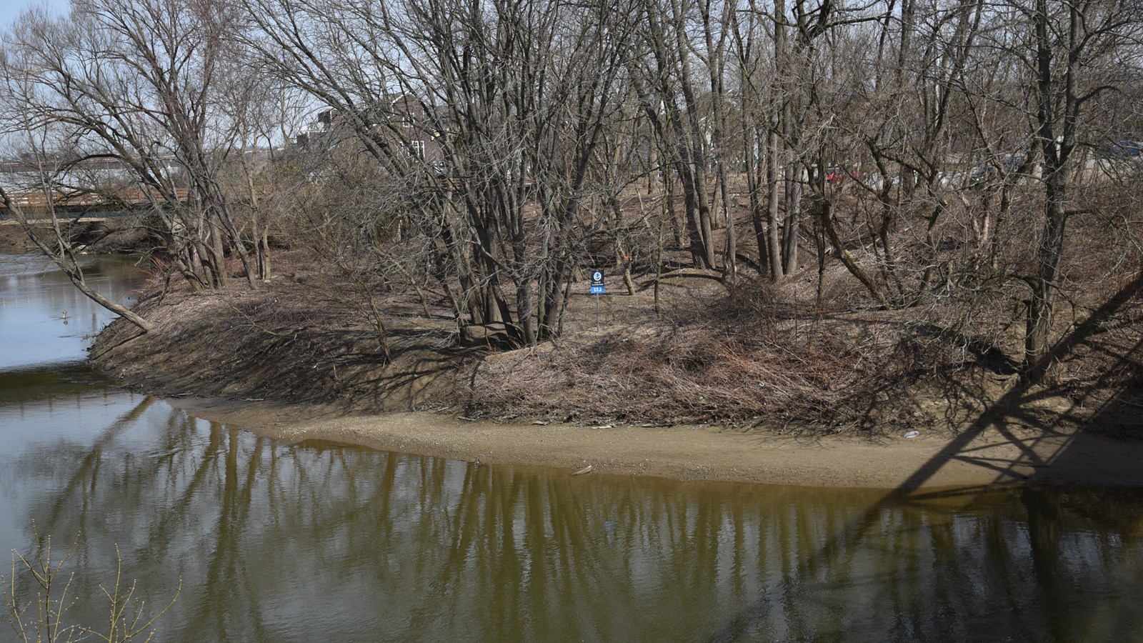 A lowered area along the Cuyahoga River used by paddlers to access the river.