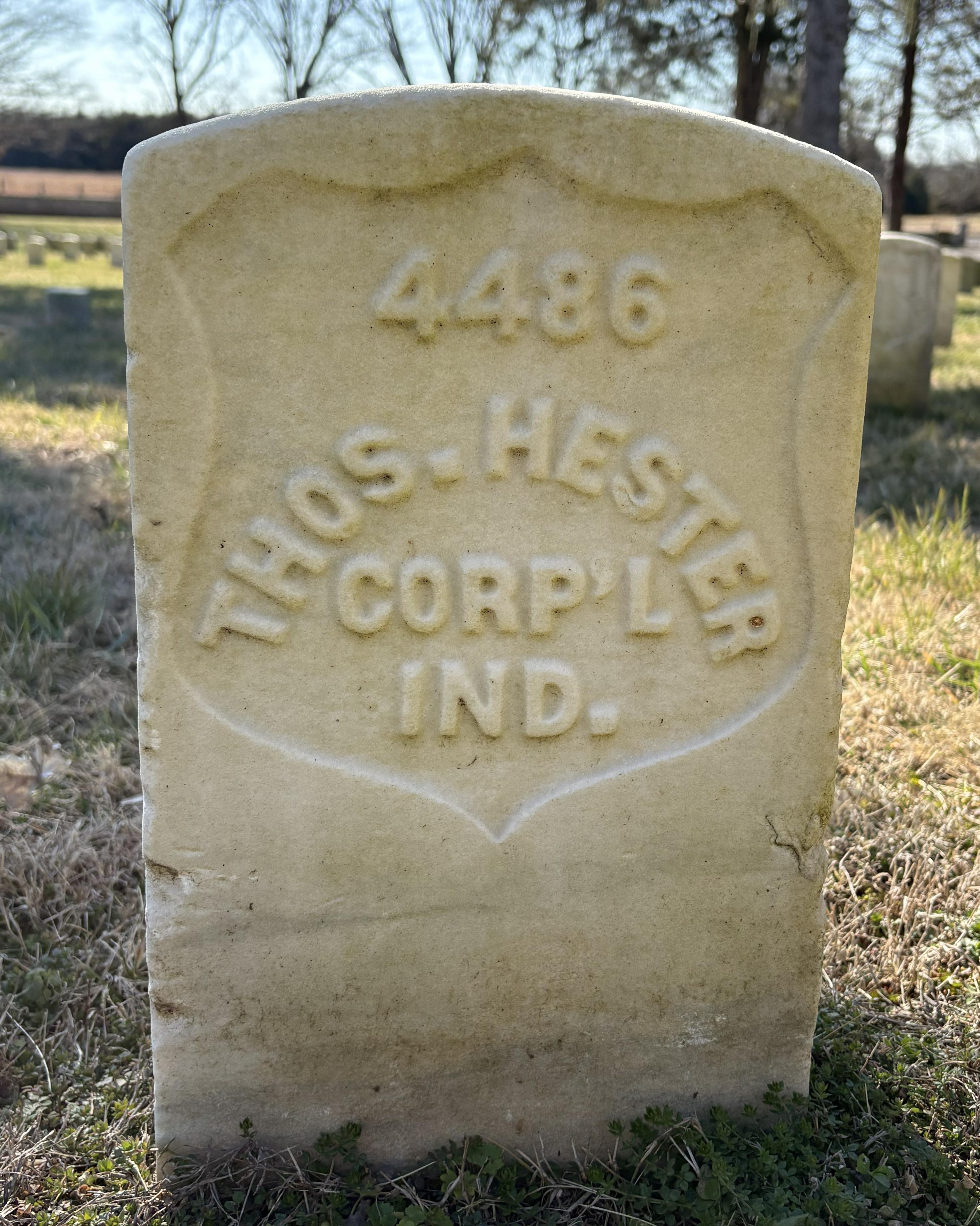 Marble headstone that reads "Thos. Hester. Corp'L Ind."