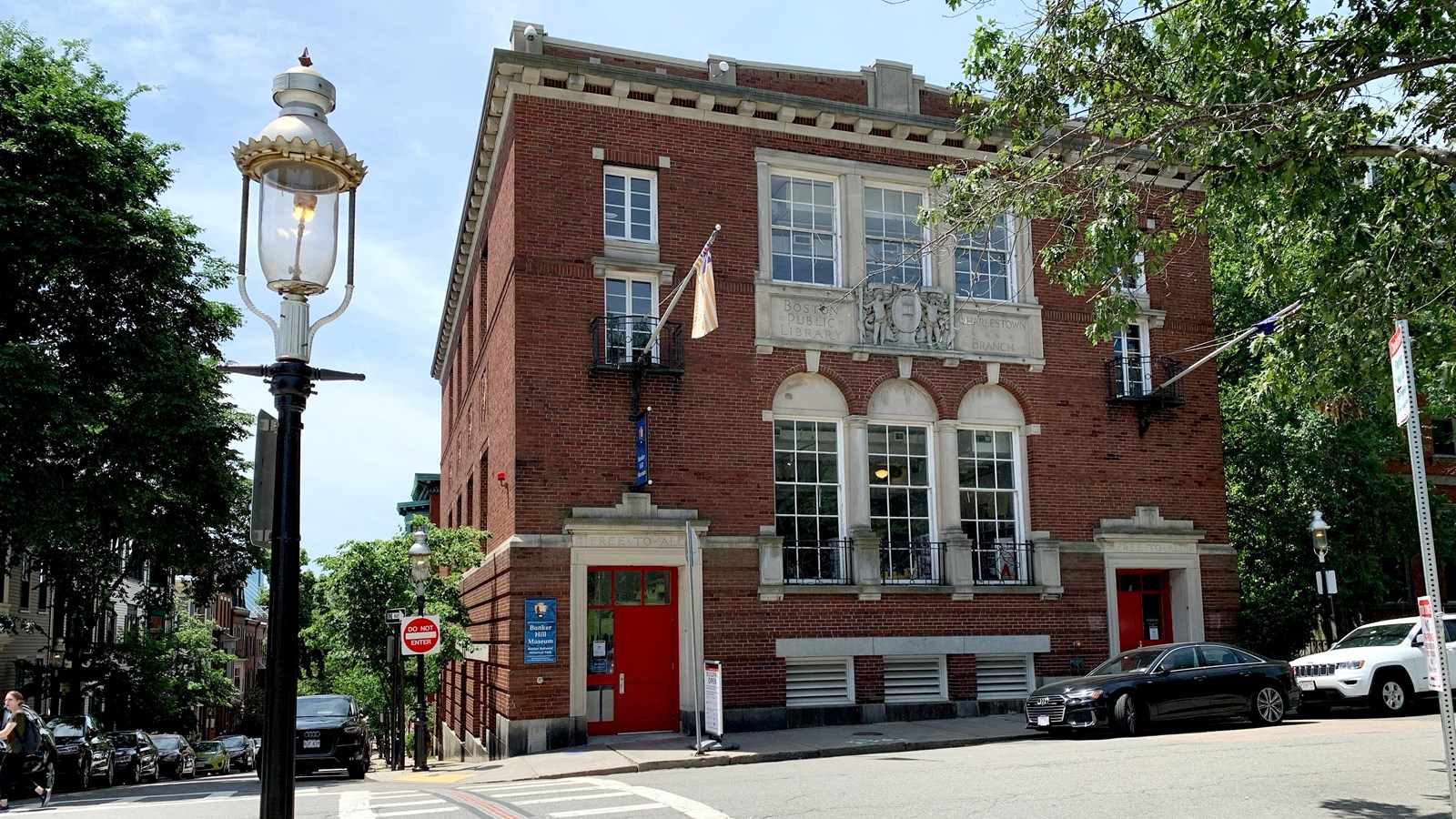 Bunker Hill Museum, a red brick building with a bright red door. 