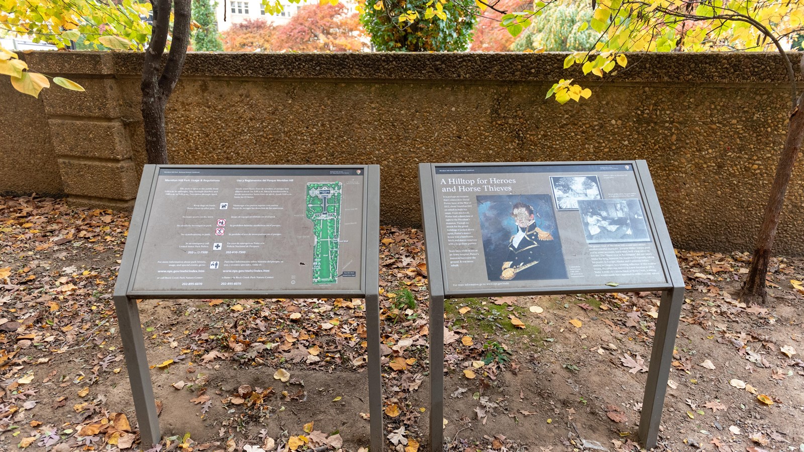 Two informational panels in front of a wall.