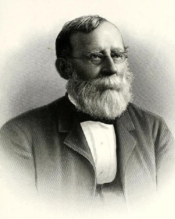 portrait of bearded man with glasses