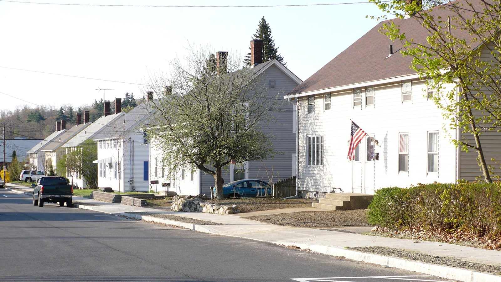 Line of mill houses on street