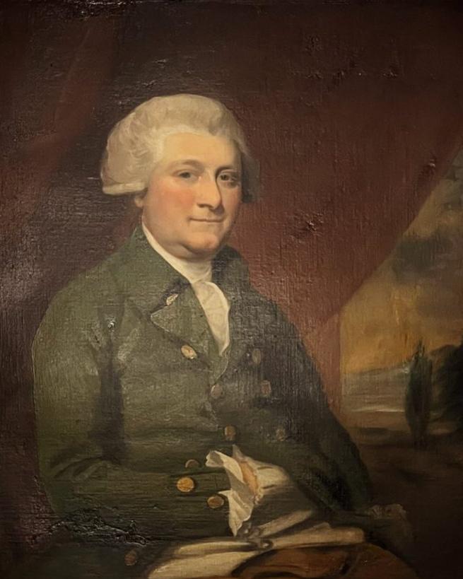 Oil painting of man wearing green double-breasted jacket with white hair, seated in front of curtain