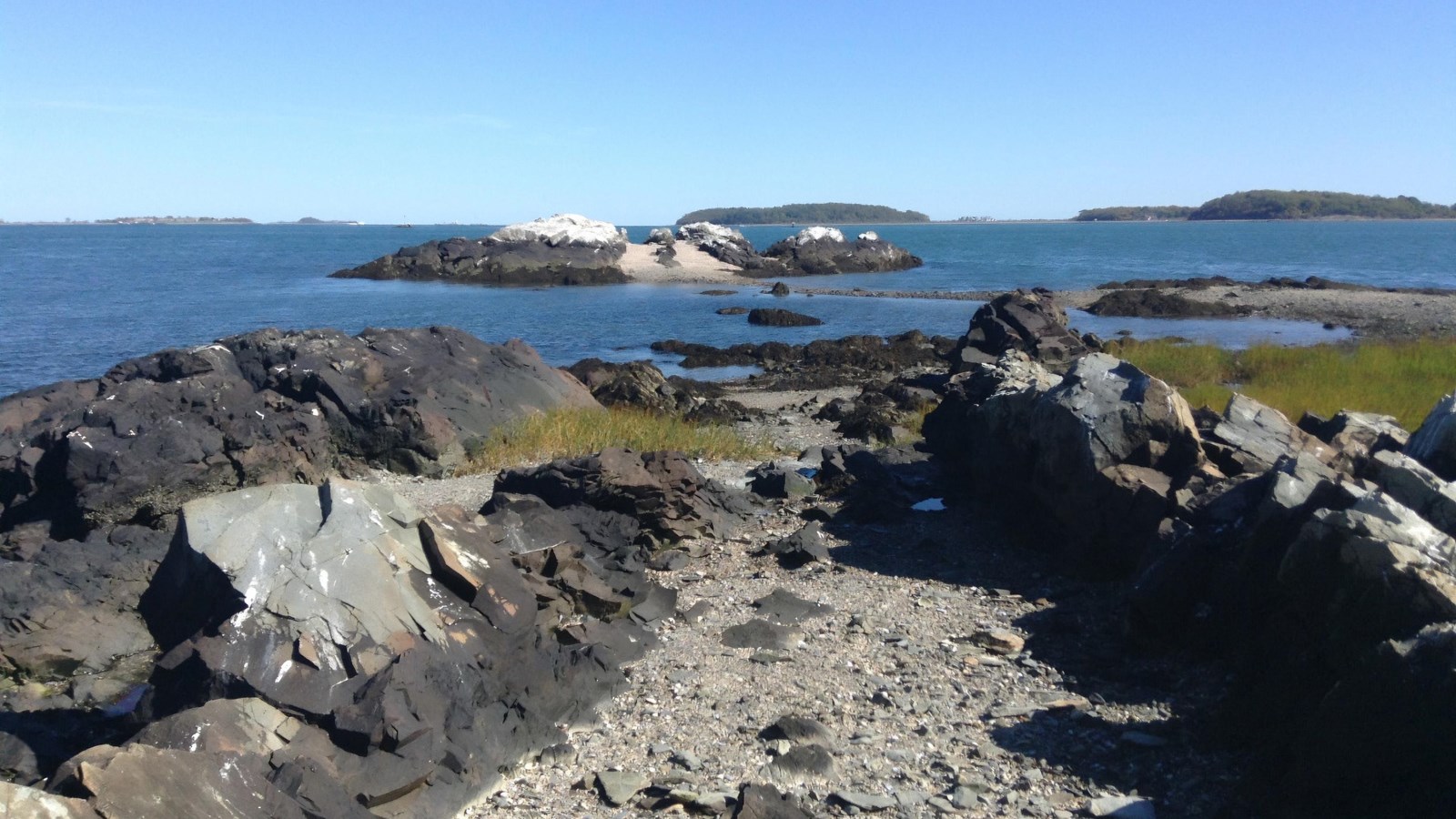 rocky outcropping with a pebble beach