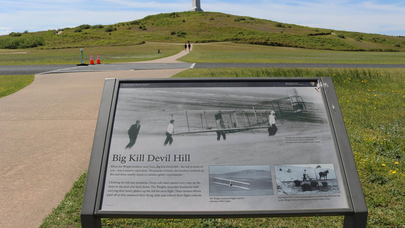 Big Kill Devil Hill wayside with the monument in the distance on top of the hill