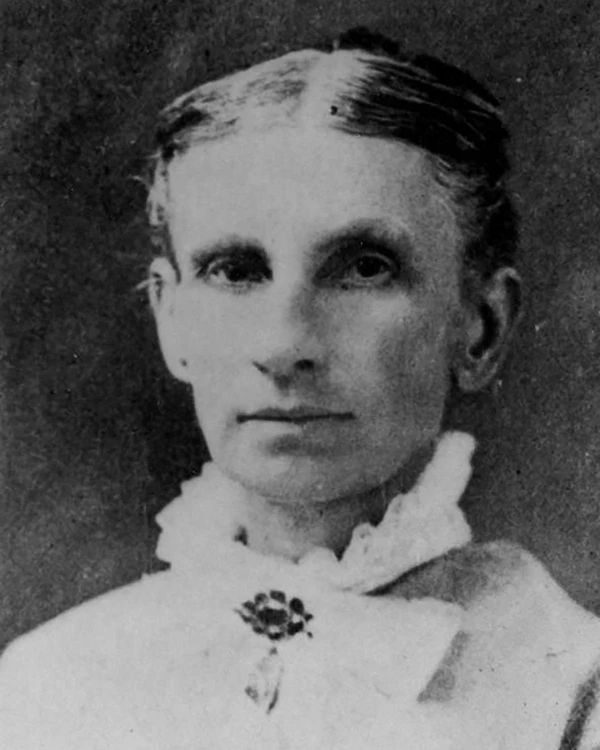 Black and white historic image of women in clothing from 1800's.