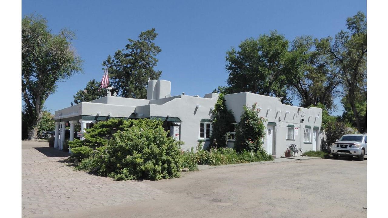 geometric shaped one story building with two entrances 