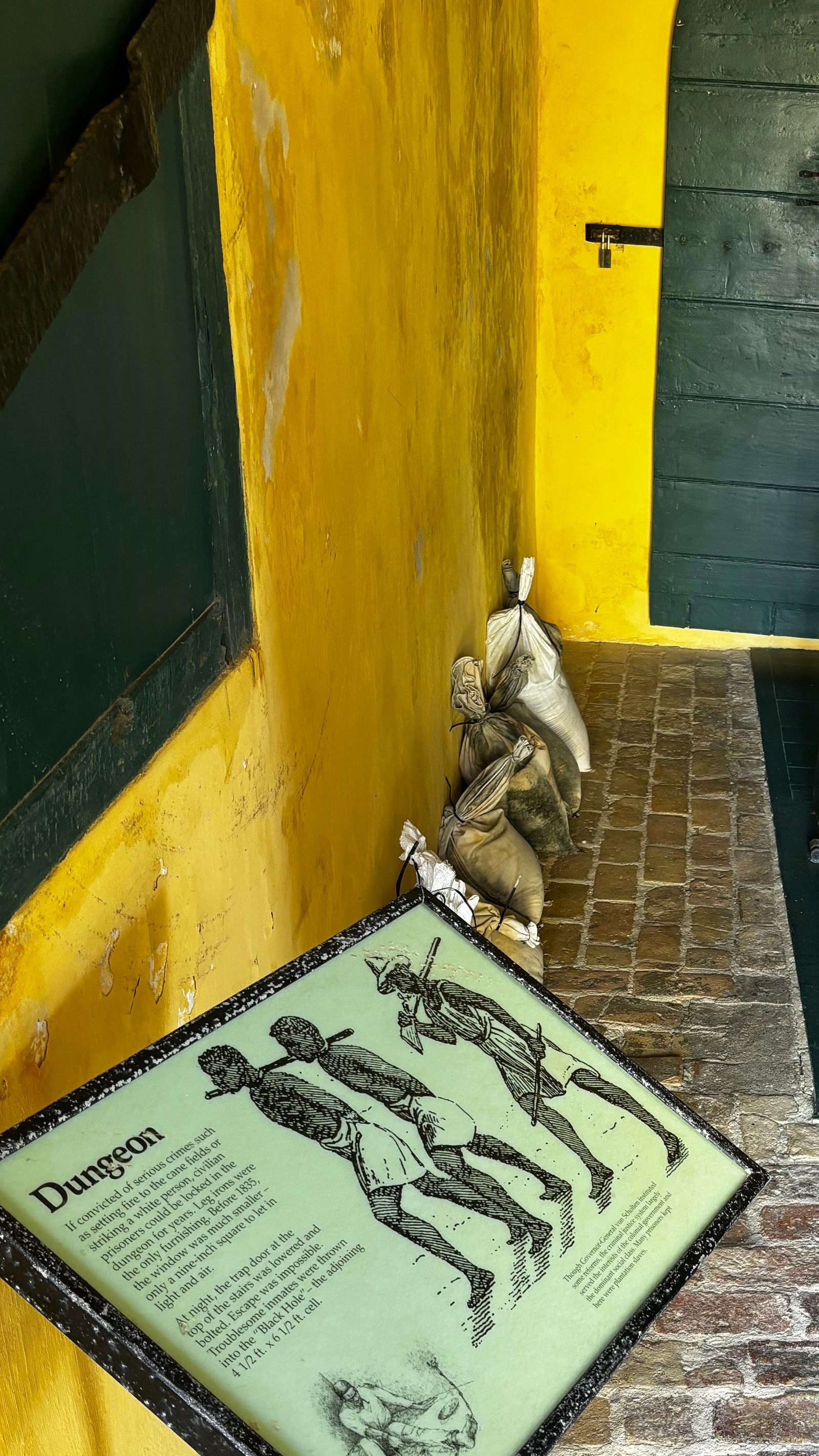 Photo of trapdoor leading to a dark void