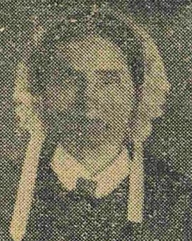 Scanned black and white newspaper picture of Elizabeth Hanks
