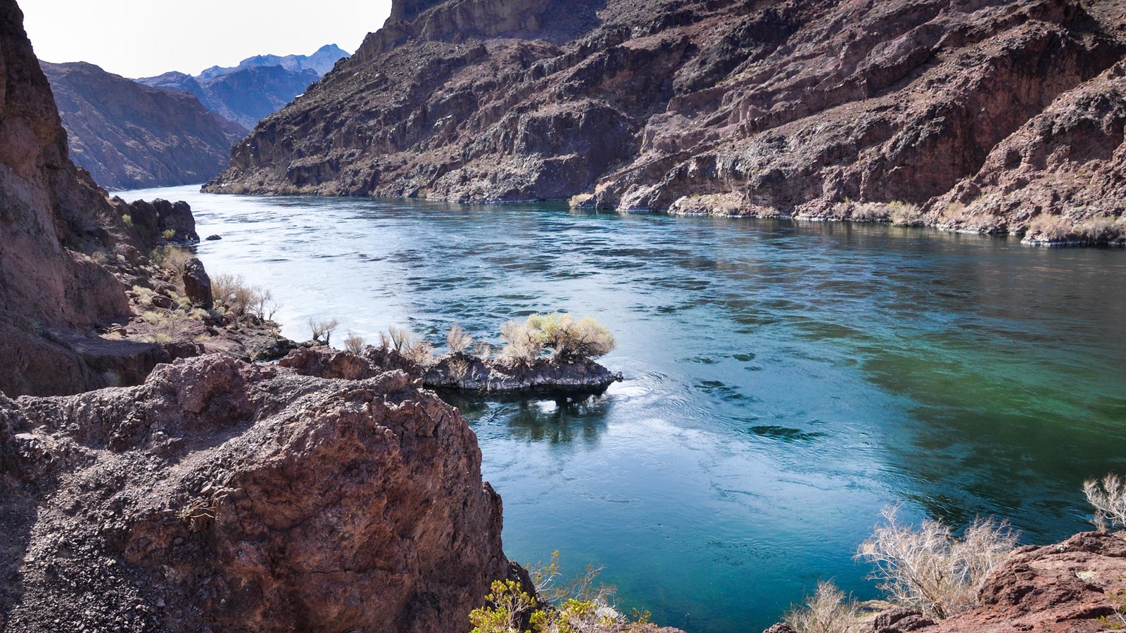 River running through canyon walls.