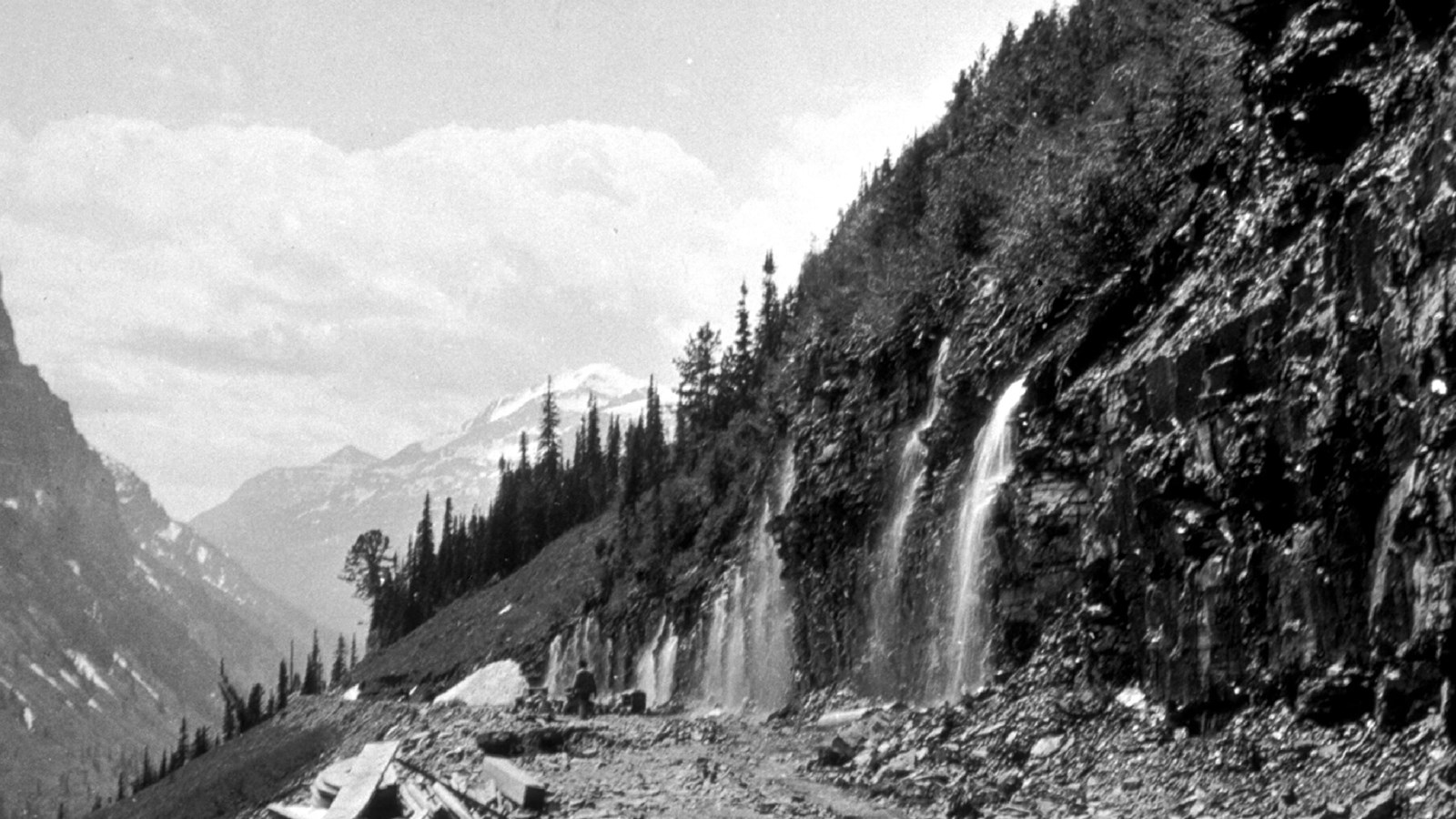 A black and white picture of the weeping wall along Going-to-the-Sun Road